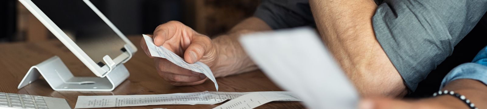 Hand holding receipt